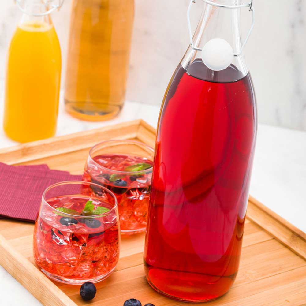 Vetri 34 oz Round Glass Nostalgic Bottle - Swing Top - 3 1/4" x 3 1/4" x 12 1/2" - 10 count box