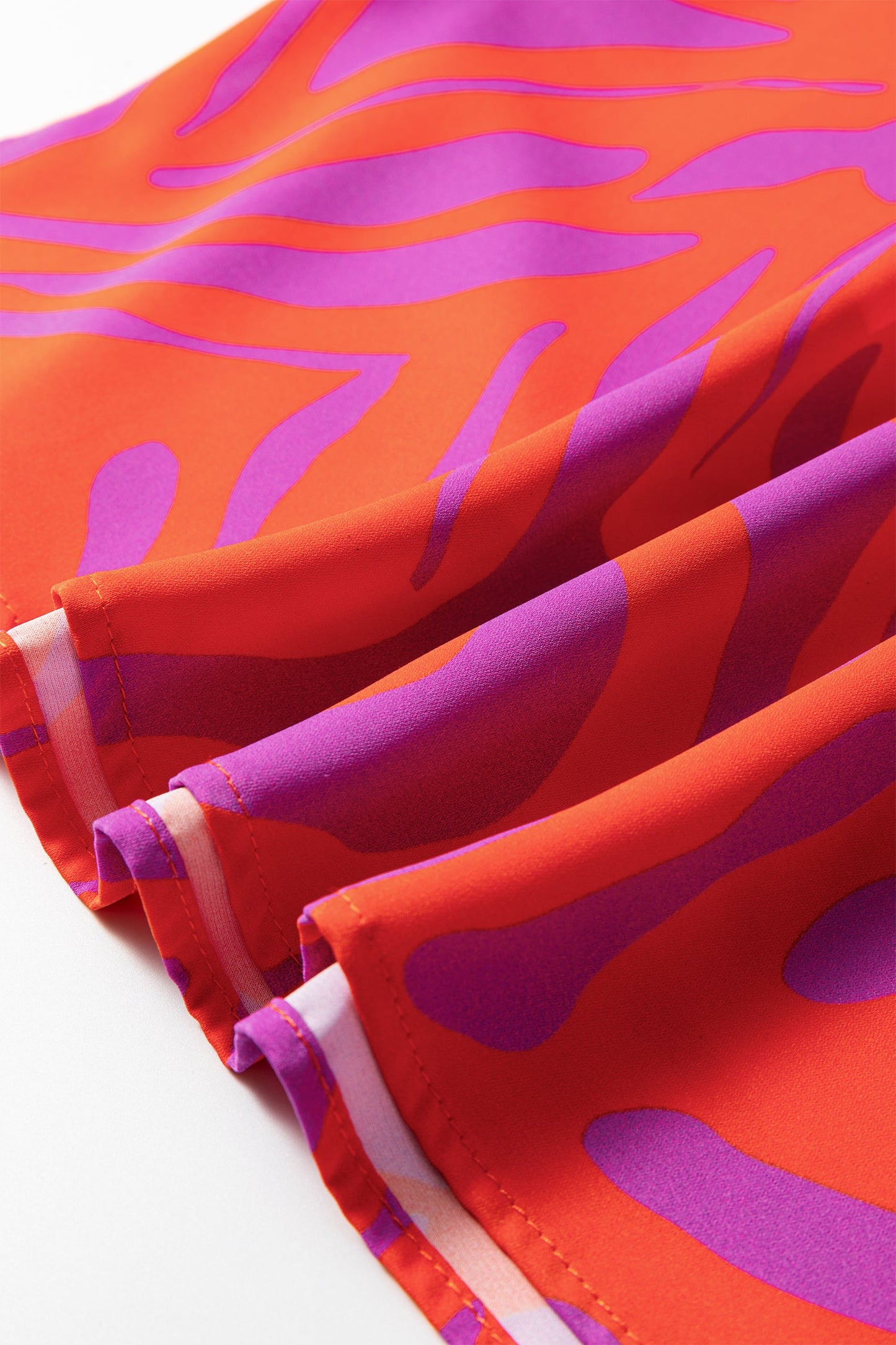 Abstract V-Neck Cuffed Short Sleeve Blouse