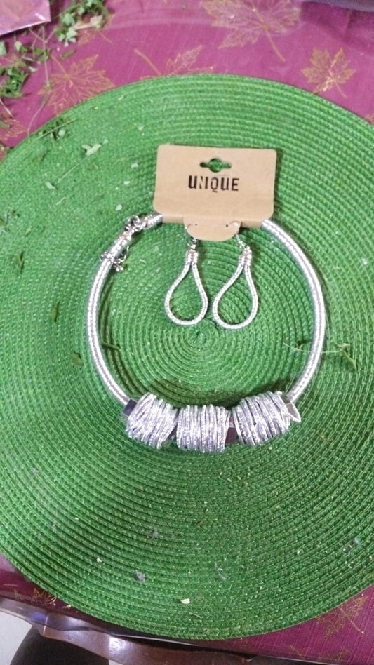 TRINI NECKLACES