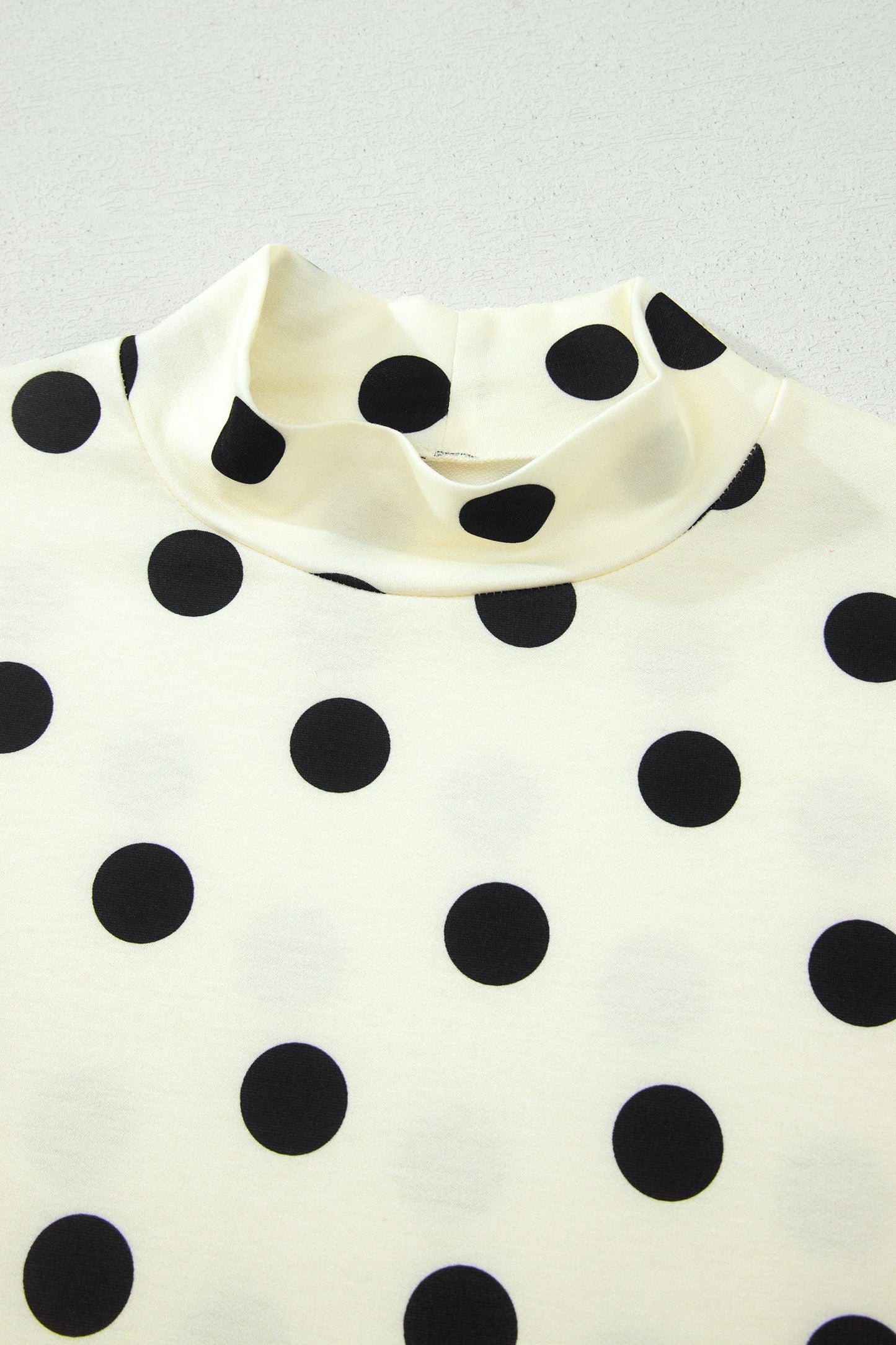 Polka Dot Mock Neck Dolman Sleeve Top