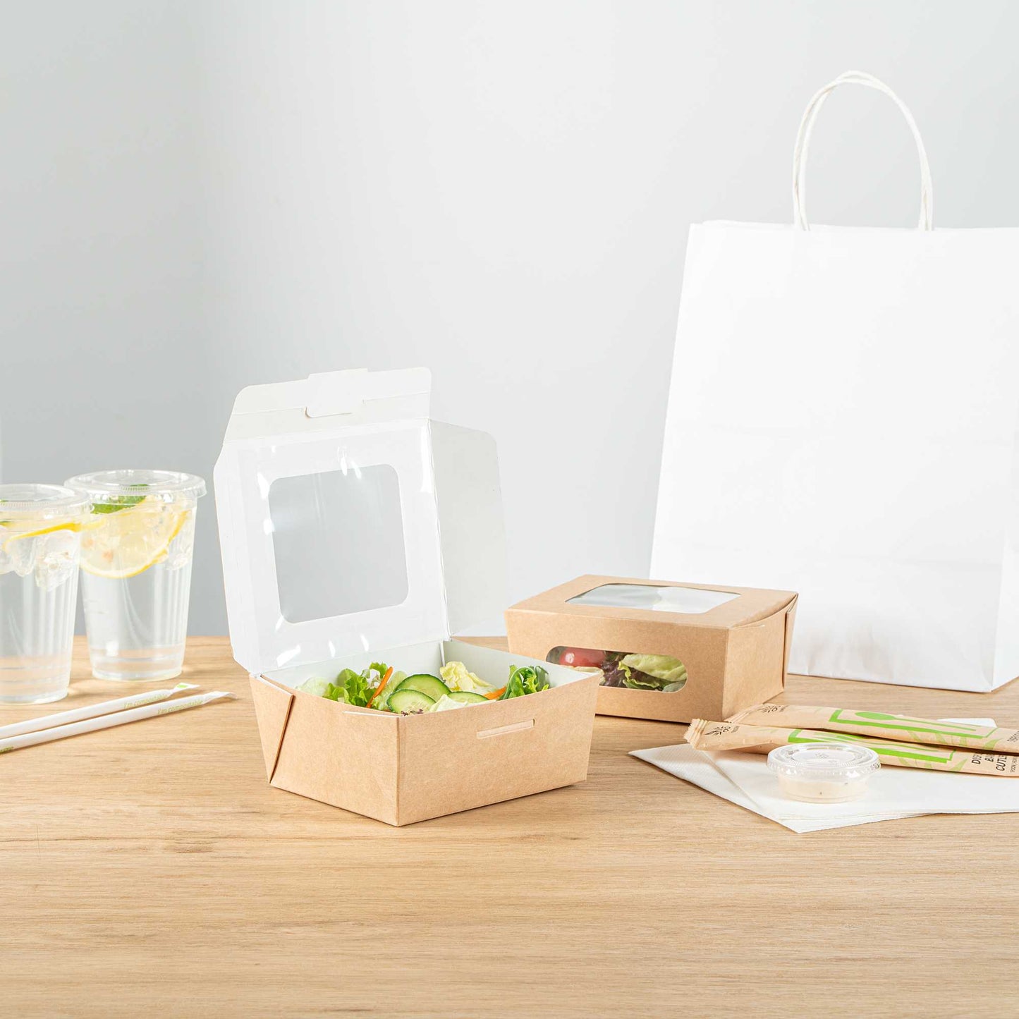 Cafe Vision 41 oz Rectangle Kraft Paper Large Bio Take Out Container - Two Windows - 5 1/4" x 6" x 2 1/2" - 200 count box