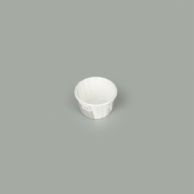 Panificio 1 oz Round Newsprint Paper Small Baking Cup - Pleated - 2" x 2" x 1 1/4" - 200 count box