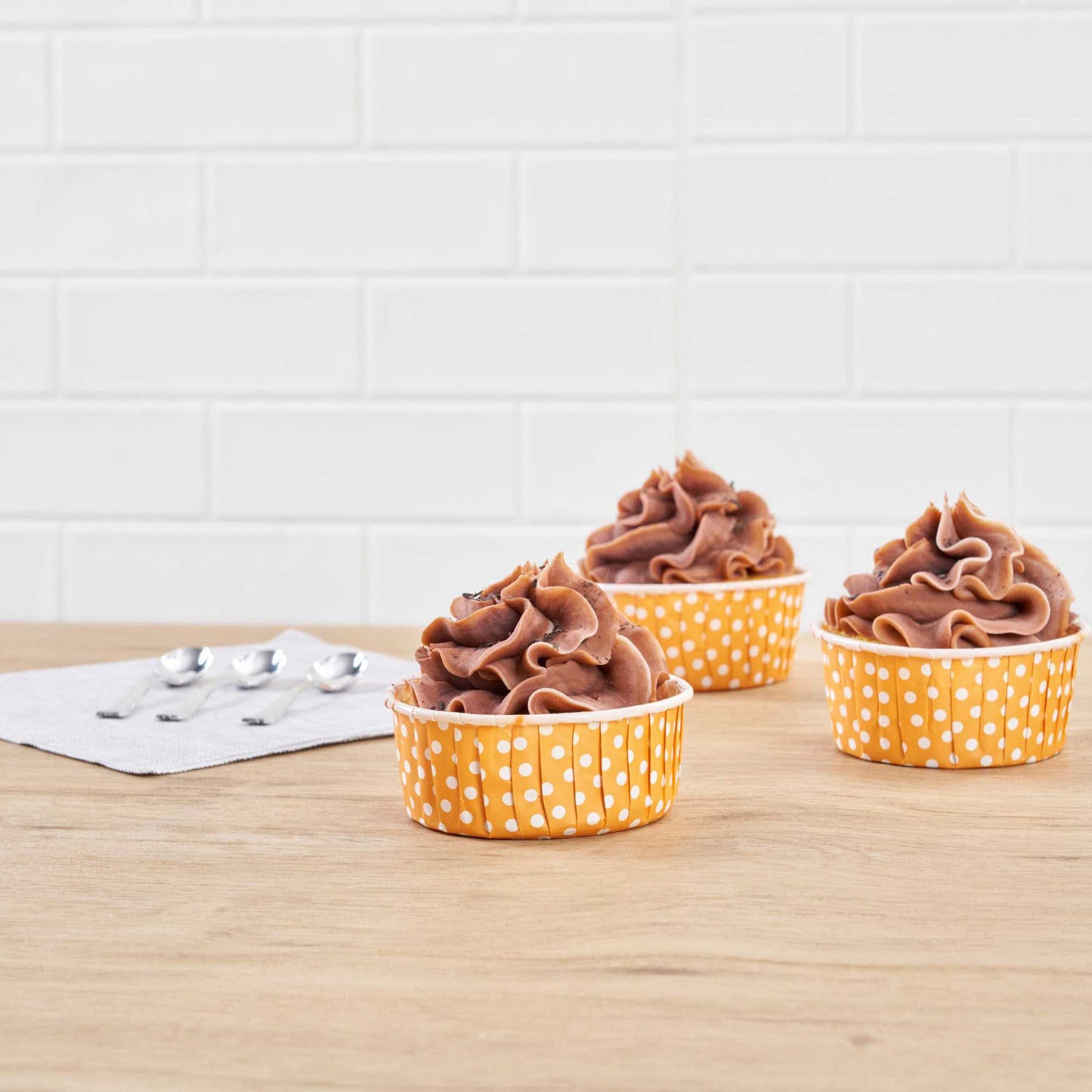 Panificio 5 oz Round Polka-Dotted Hot Orange Paper Large Baking Cup - Pleated - 3 3/4" x 3 3/4" x 1 1/2" - 200 count box
