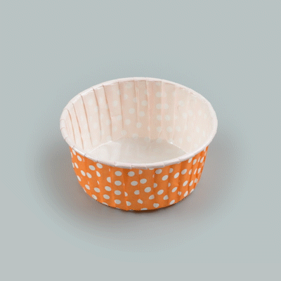 Panificio 5 oz Round Polka-Dotted Hot Orange Paper Large Baking Cup - Pleated - 3 3/4" x 3 3/4" x 1 1/2" - 200 count box