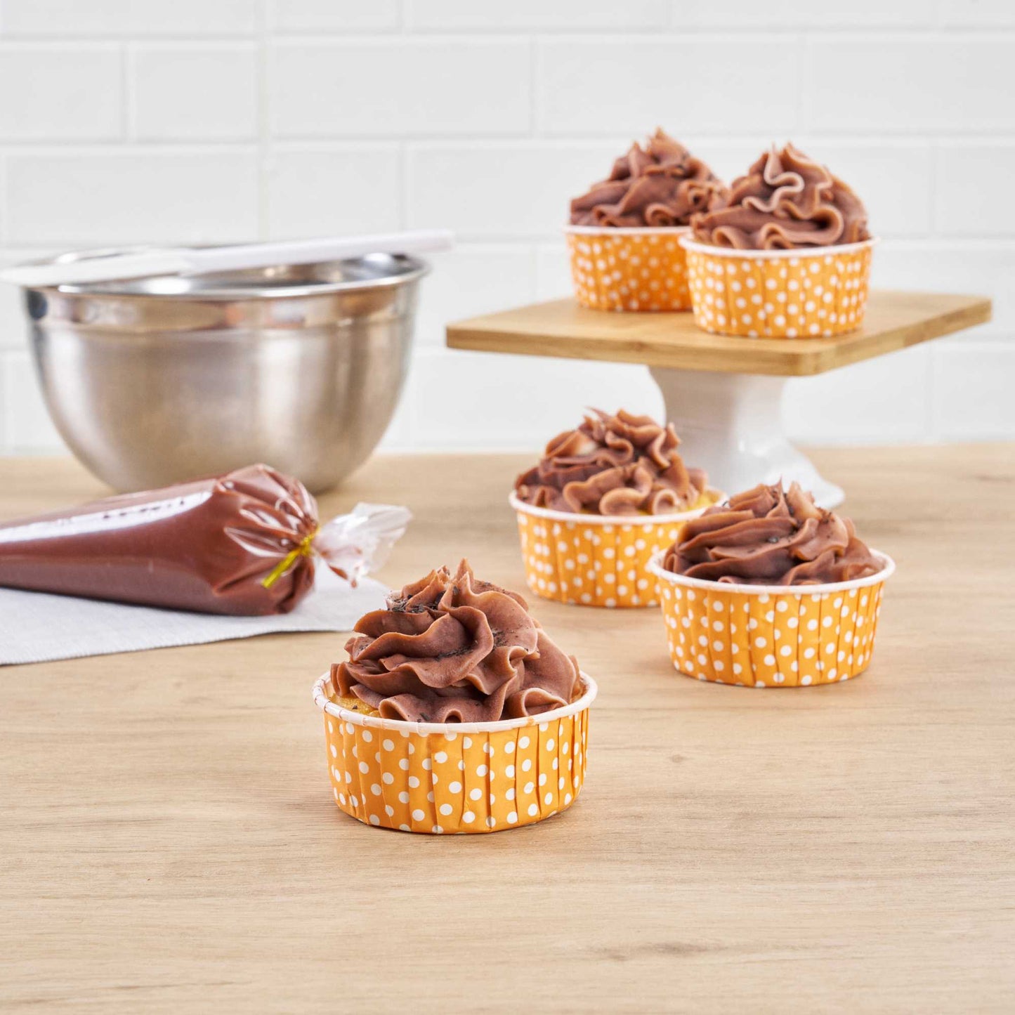 Panificio 5 oz Round Polka-Dotted Hot Orange Paper Large Baking Cup - Pleated - 3 3/4" x 3 3/4" x 1 1/2" - 200 count box