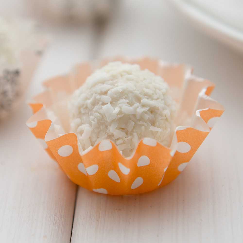 Panificio 0.4 oz Round Polka-Dotted Hot Orange Paper Mini Baking Cup - Flared - 2" x 2" x 1/2" - 200 count box