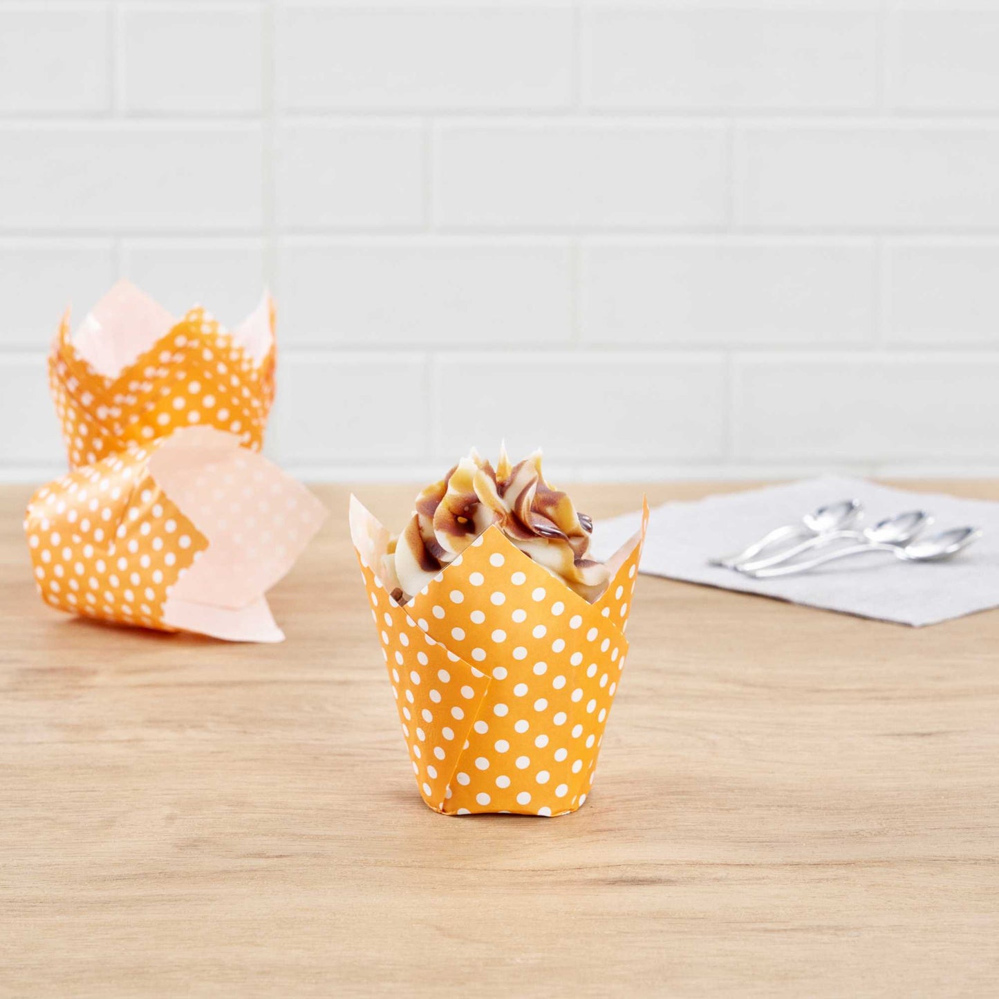 Panificio 2 oz Tulip Polka-Dotted Hot Orange Paper Tall Baking Cup - 3 1/4" x 3 1/4" x 3 1/2" - 200 count box