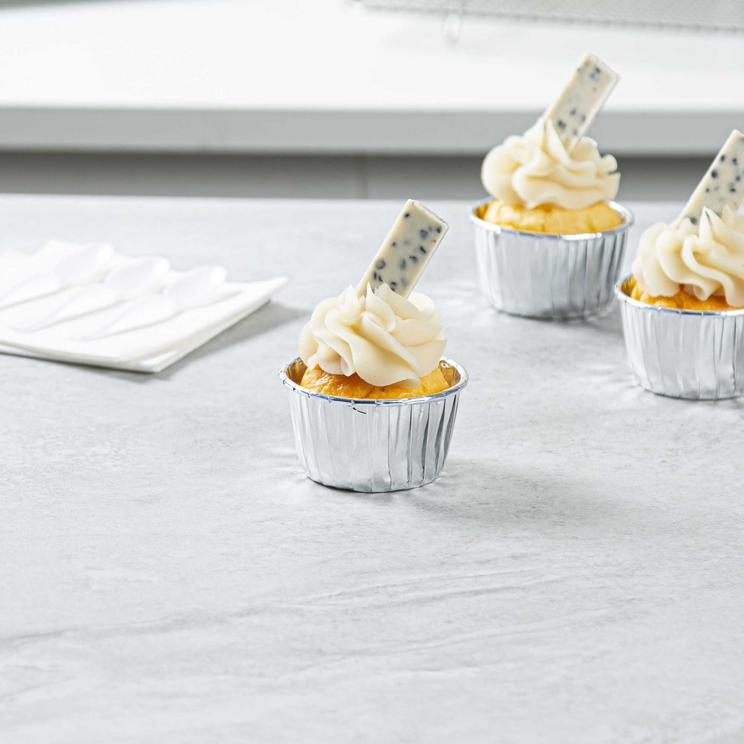 Panificio 3 oz Round Metallic Silver Paper Small Baking Cup - Pleated - 2 1/2" x 2 1/2" x 1 1/2" - 200 count box