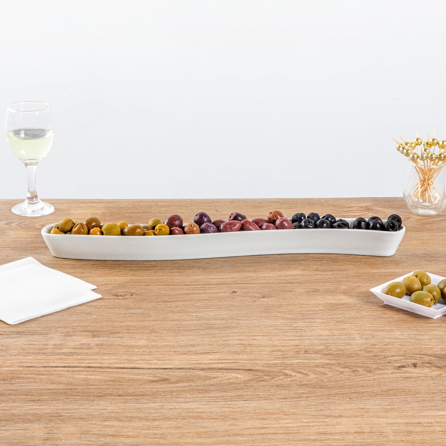 Chef 101 Swerve 14 oz Curved White Porcelain Olive Plate - 17" x 2 1/2" x 1 1/4" - 1 count box
