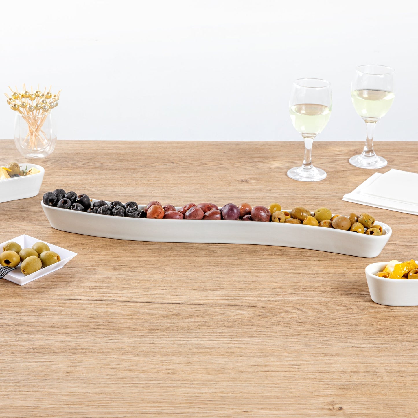 Chef 101 Swerve 14 oz Curved White Porcelain Olive Plate - 17" x 2 1/2" x 1 1/4" - 1 count box