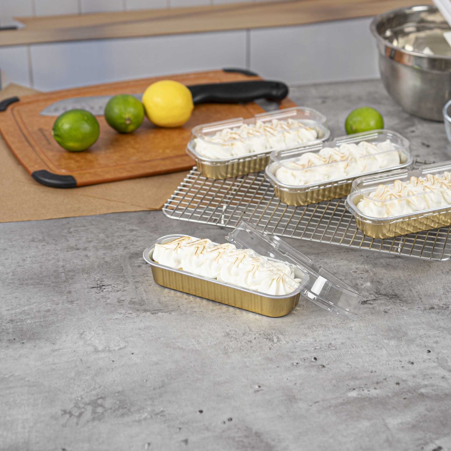 7 oz Rectangle Gold Aluminum Baking Loaf Pan - with Plastic Dome Lid - 6 1/2" x 2 1/2" x 1 1/4" - 100 count box