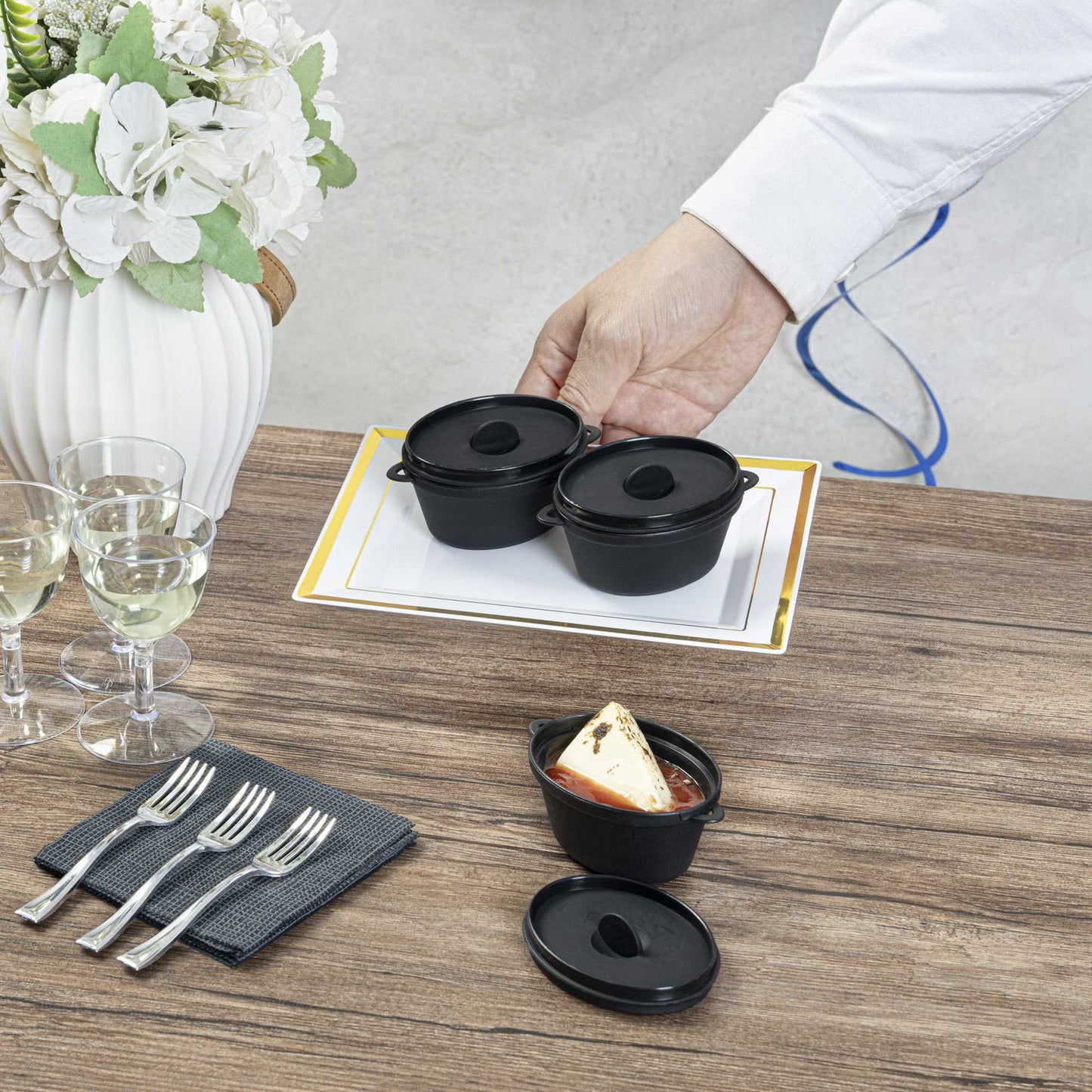 Mini Serve 3 oz Oval Black Plastic Mini Kettle Dish - 3" x 2 1/4" x 1 1/2" - 100 count box
