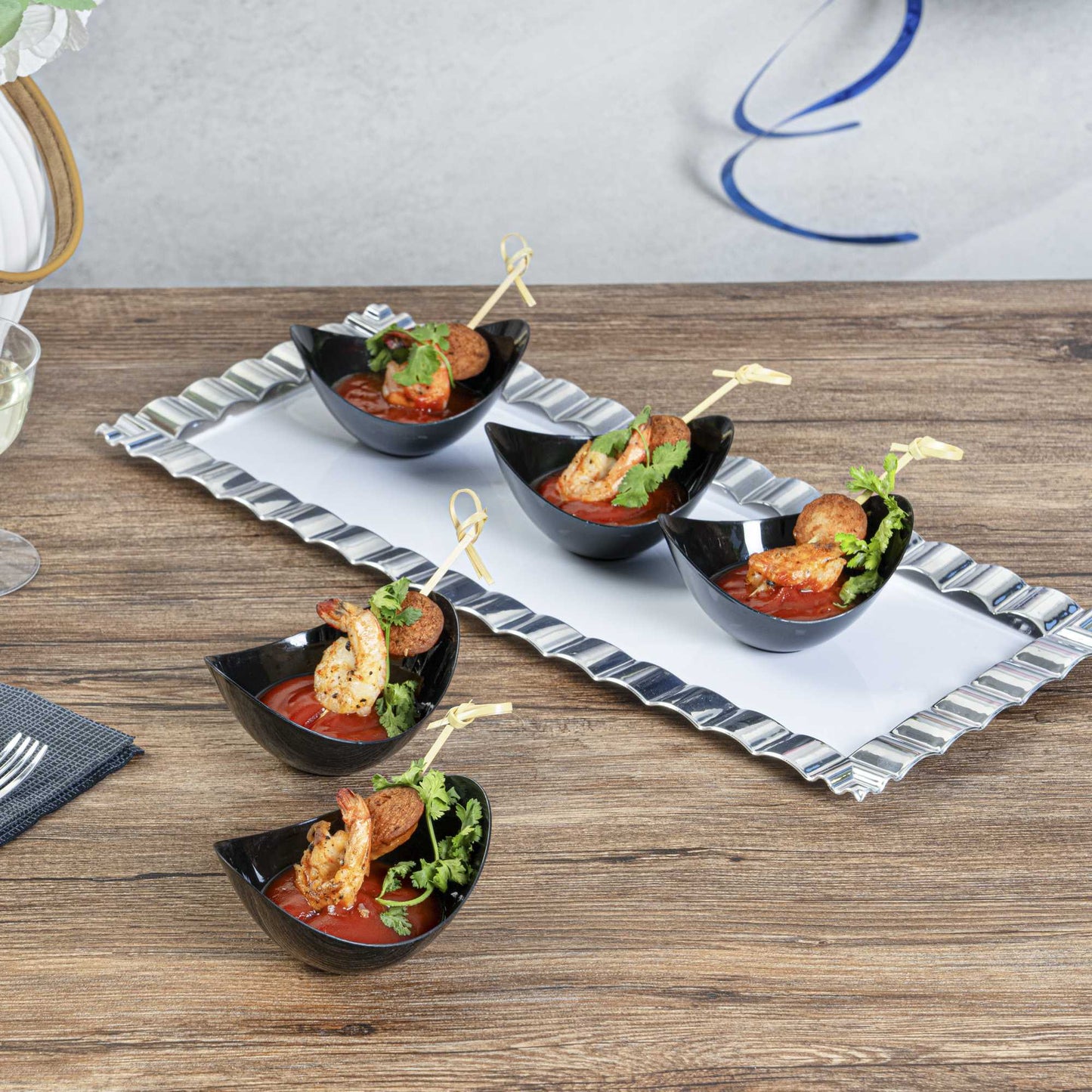 Mini Serve 2 oz Oval Black Plastic Alato Tasting Dish - 3 1/2" x 2 3/4" x 1 3/4" - 100 count box
