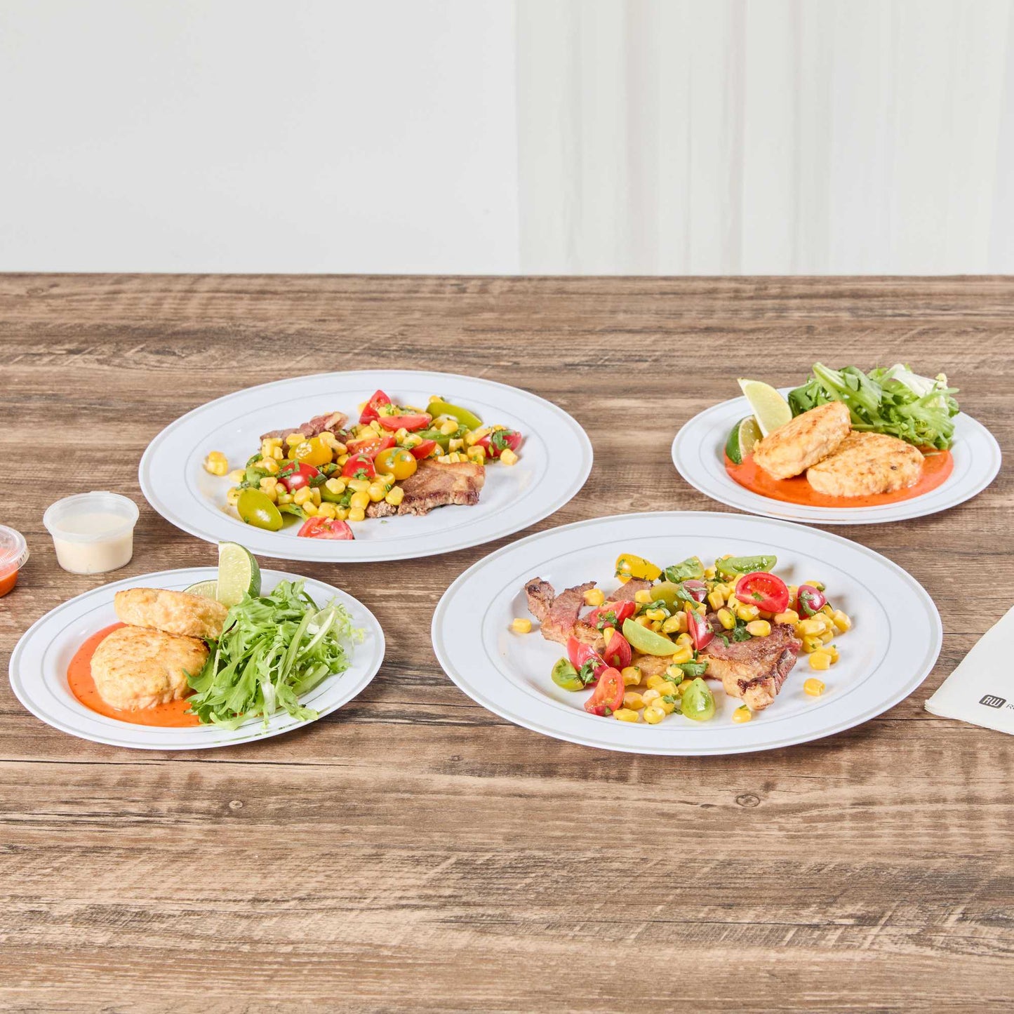 Maxi Serve Round White Plastic Silver-Rimmed Plate - 10 1/2" x 10 1/2" x 1/2" - 100 count box