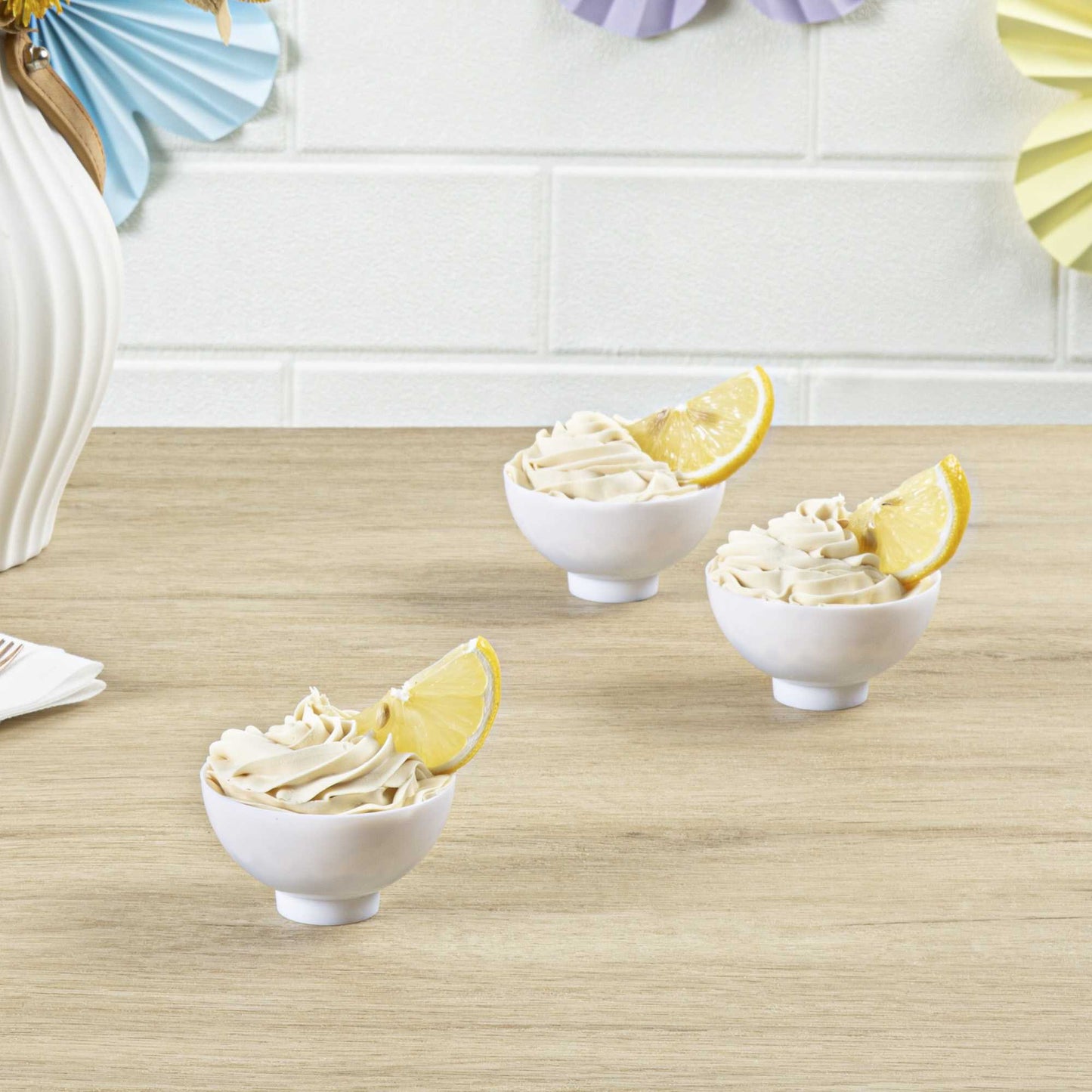 Mini Serve 2 oz Round White Plastic Coppa Bowl - 2 1/2" x 2 1/2" x 1" - 100 count box