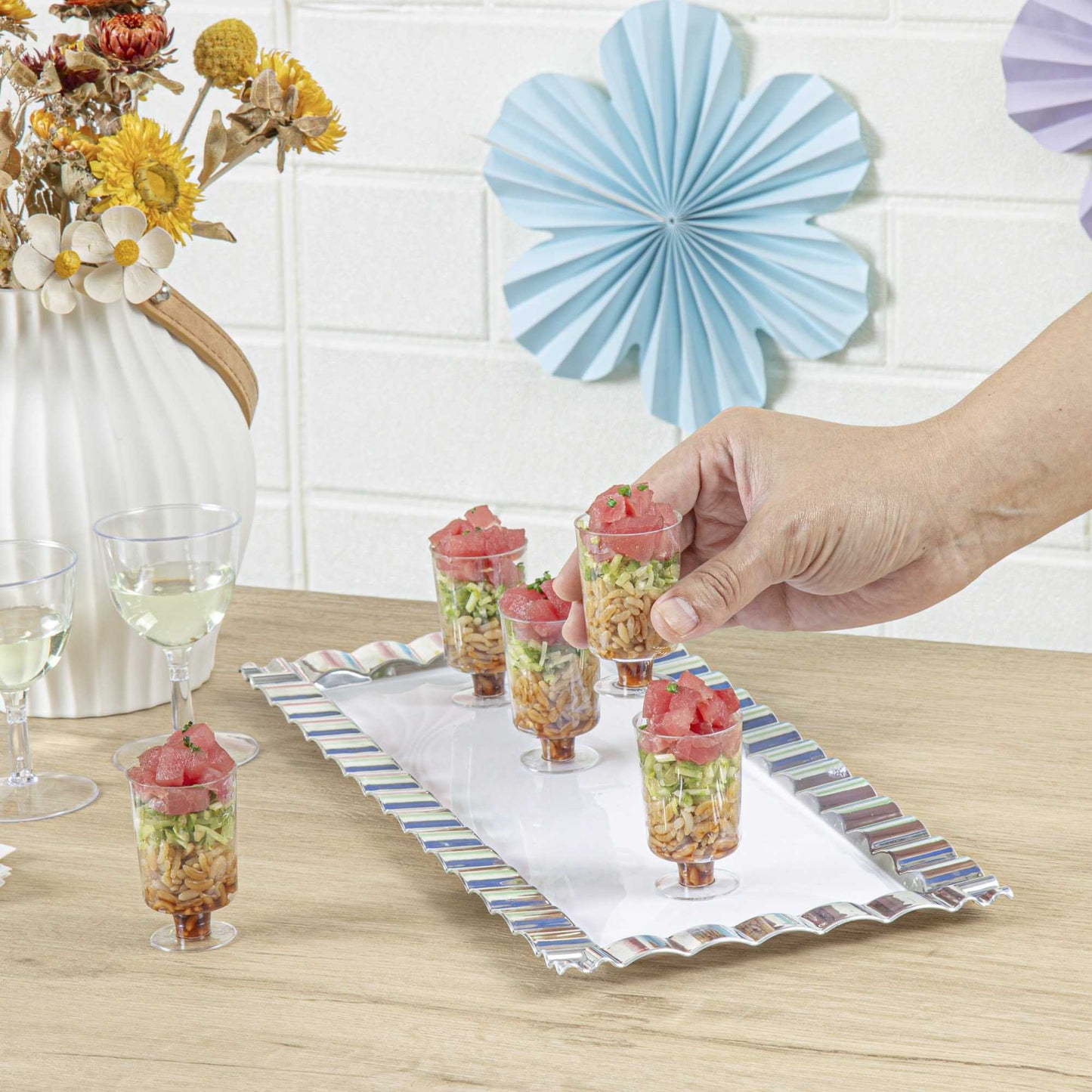 Mini Serve 1 oz Round Clear Plastic Lufthansa Drinking Cup - Stackable - 1 1/2" x 1 1/2" x 2 1/2" - 100 count box