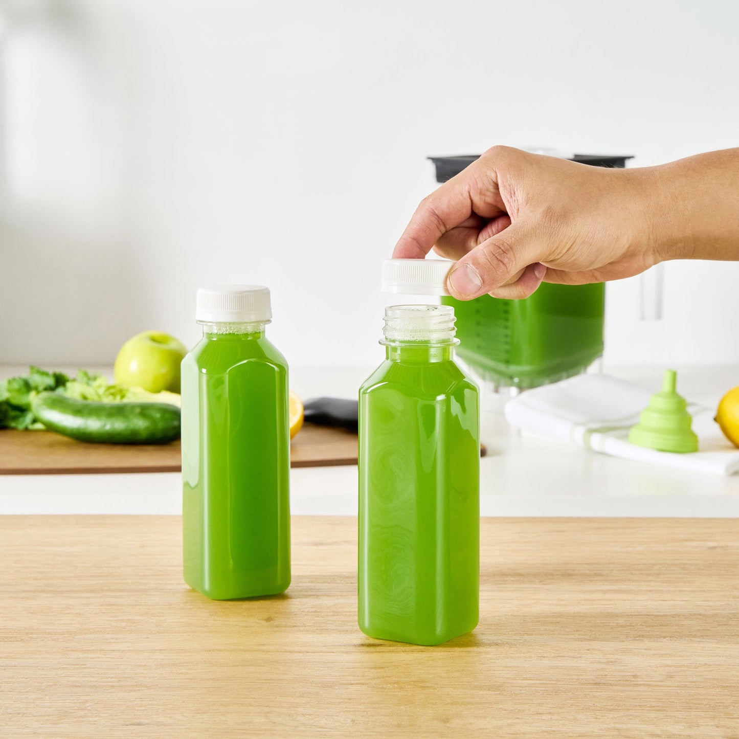 Bottle Tek 12 oz Square Clear Plastic Cold Pressed Juice Bottle - with Safety Cap - 2" x 2" x 6 1/2" - 100 count box