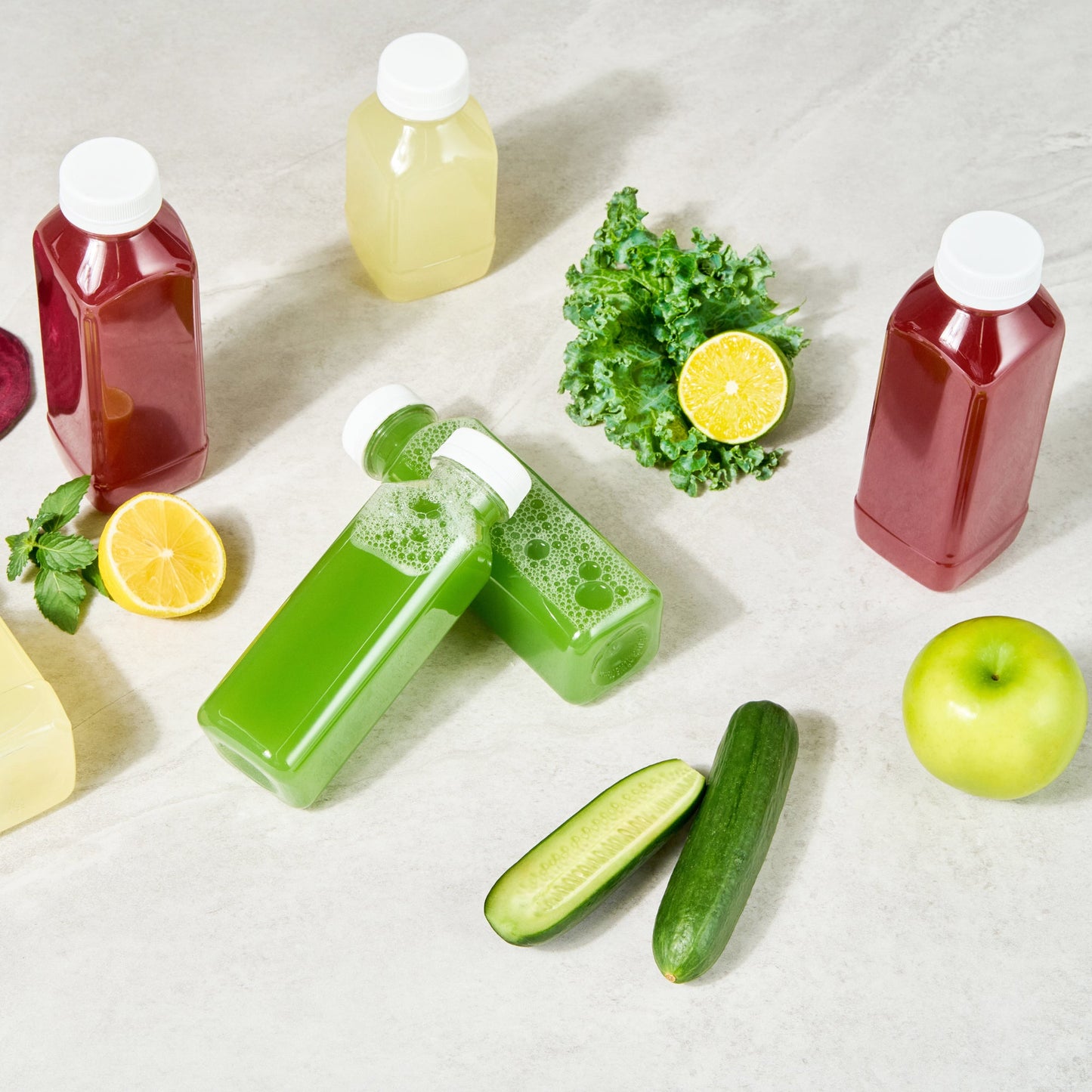 Bottle Tek 12 oz Square Clear Plastic Cold Pressed Juice Bottle - with Safety Cap - 2" x 2" x 6 1/2" - 100 count box