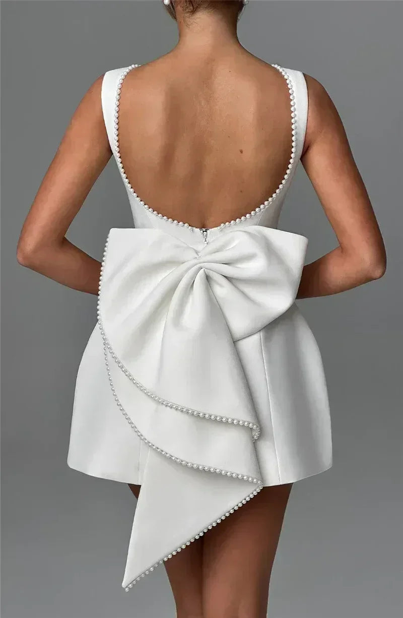 Mozision Pearl Bow Backless Sexy Mini Dress For Women Robe Fashion Zipper Sleeveless High Waist A-line Club Party Dress Elegant