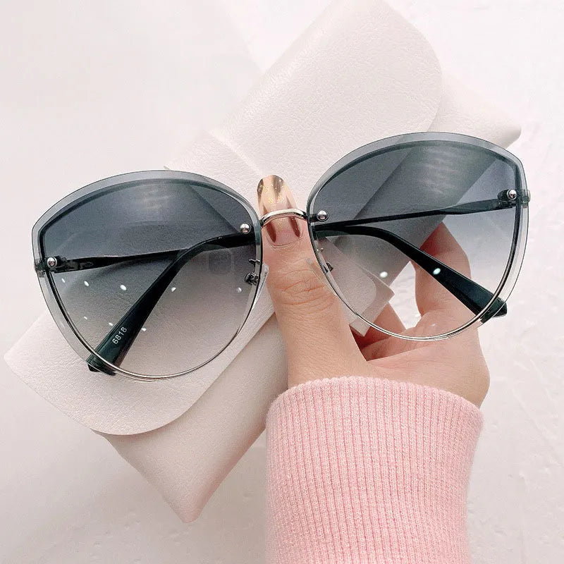 High Quality women's Oval Rimless Sunglasses Lady Metal Cay Eye Shades for Women Driving Glasses Sonnenbrille zonnebril dames