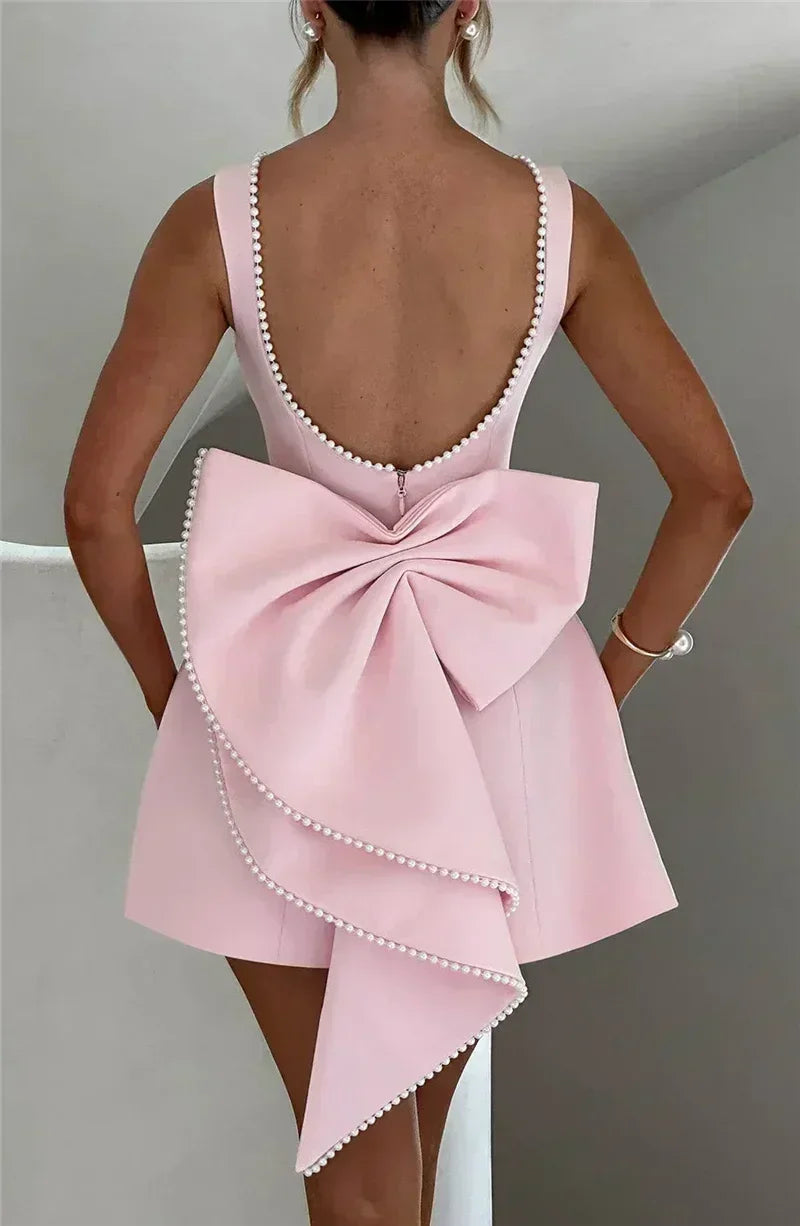Mozision Pearl Bow Backless Sexy Mini Dress For Women Robe Fashion Zipper Sleeveless High Waist A-line Club Party Dress Elegant