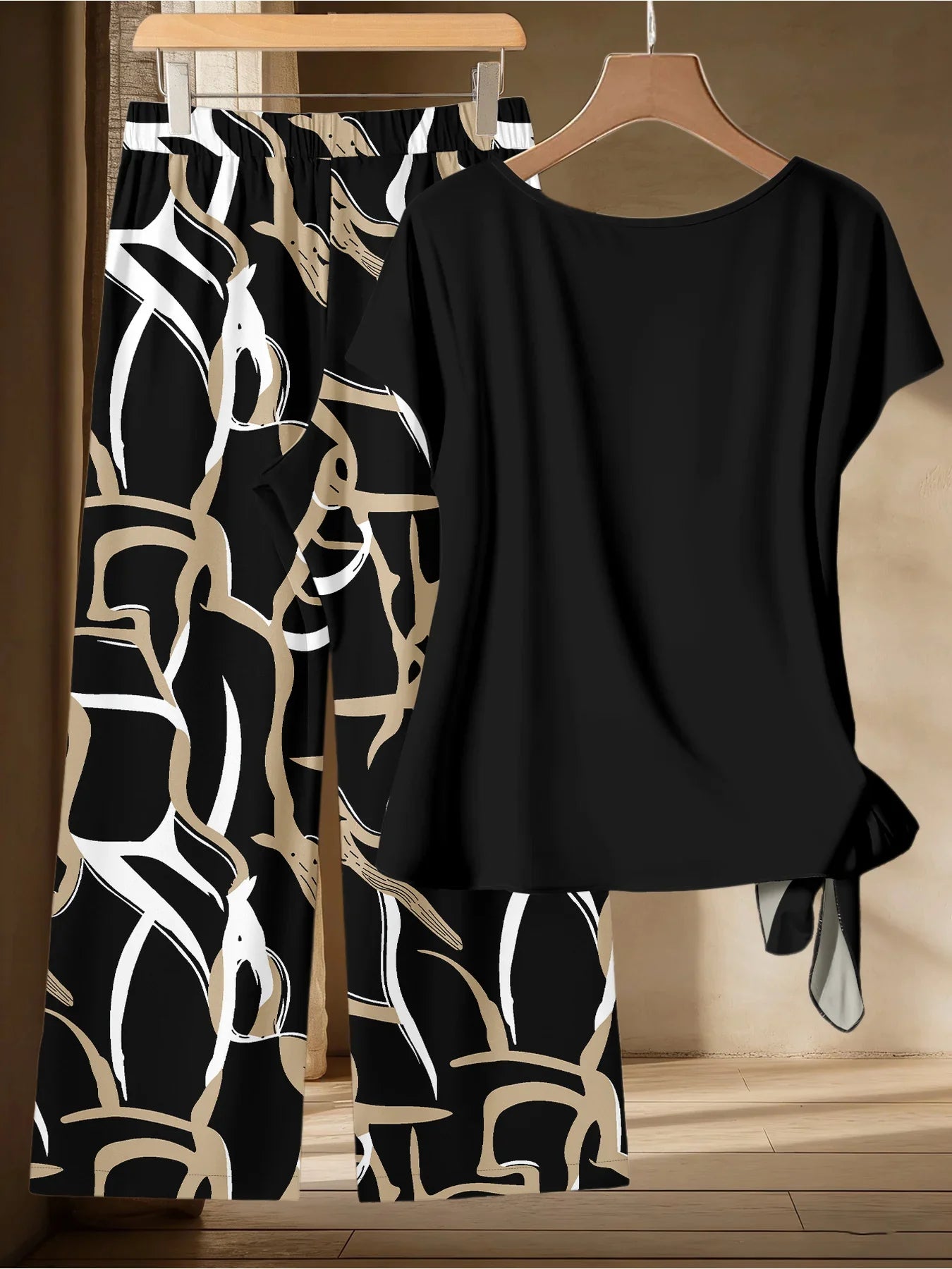 Casual and Elegant Women's Plus Size Premium Black Gold Abstract Print Set Summer Lazy Style Twisted Top Wide Leg Pants