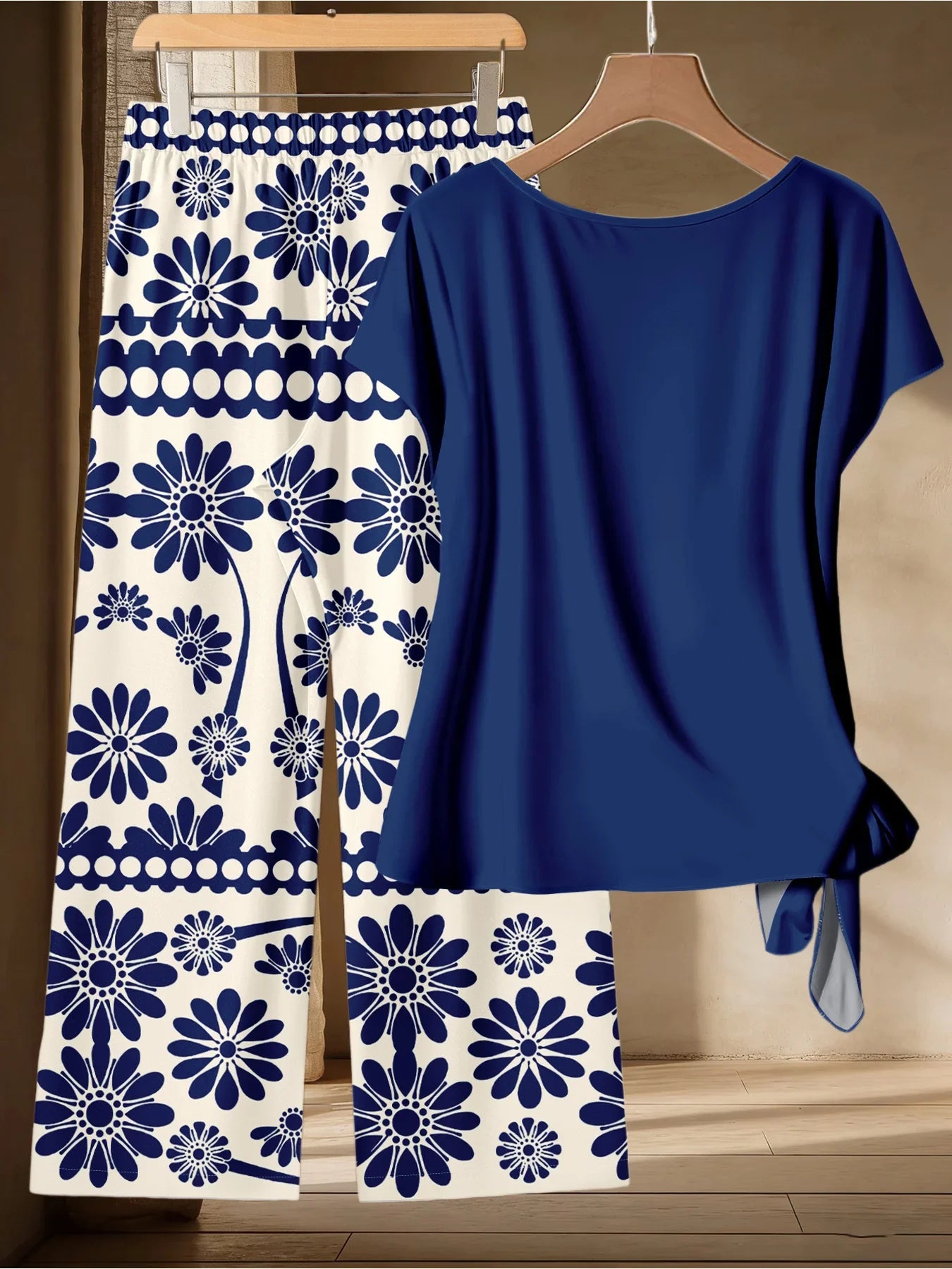 Summer Women's Plus Size Casual Loose Two-Piece Set Solid Color Twisted T-Shirt + Blue and White Printed Wide Leg Pants Set