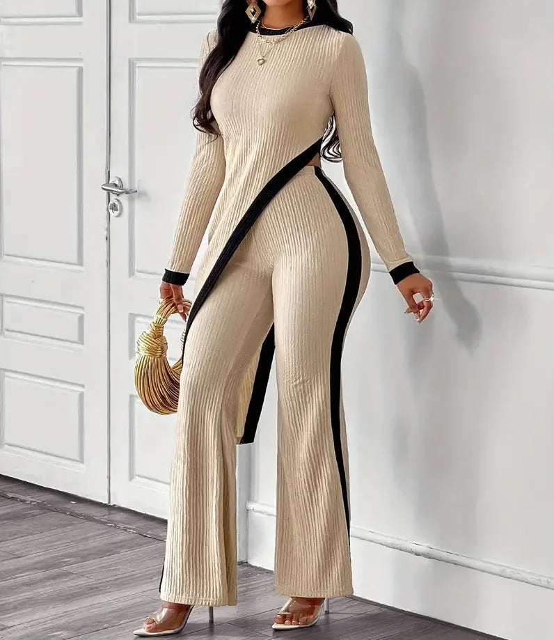 Elegant women's tight fitting asymmetrical hem pants top set for women.